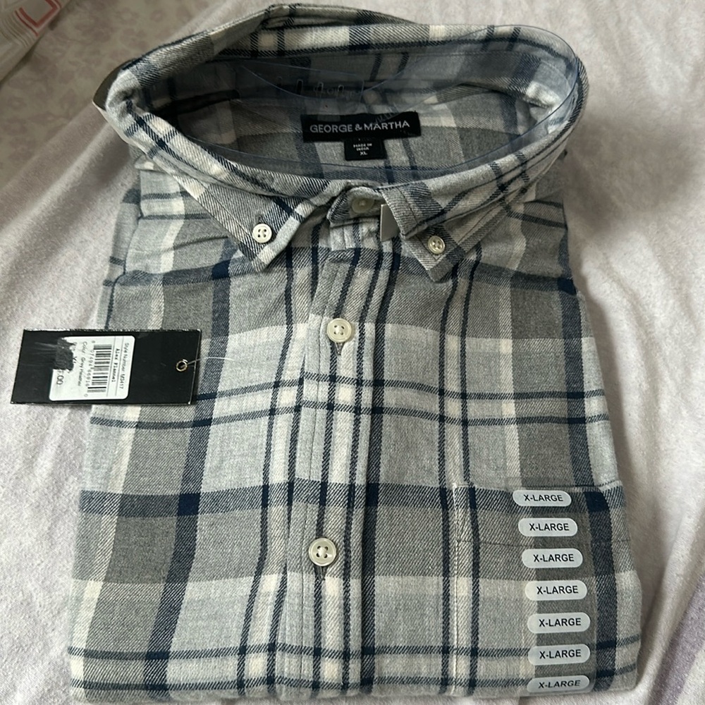Long sleeve flannel button down shirt.